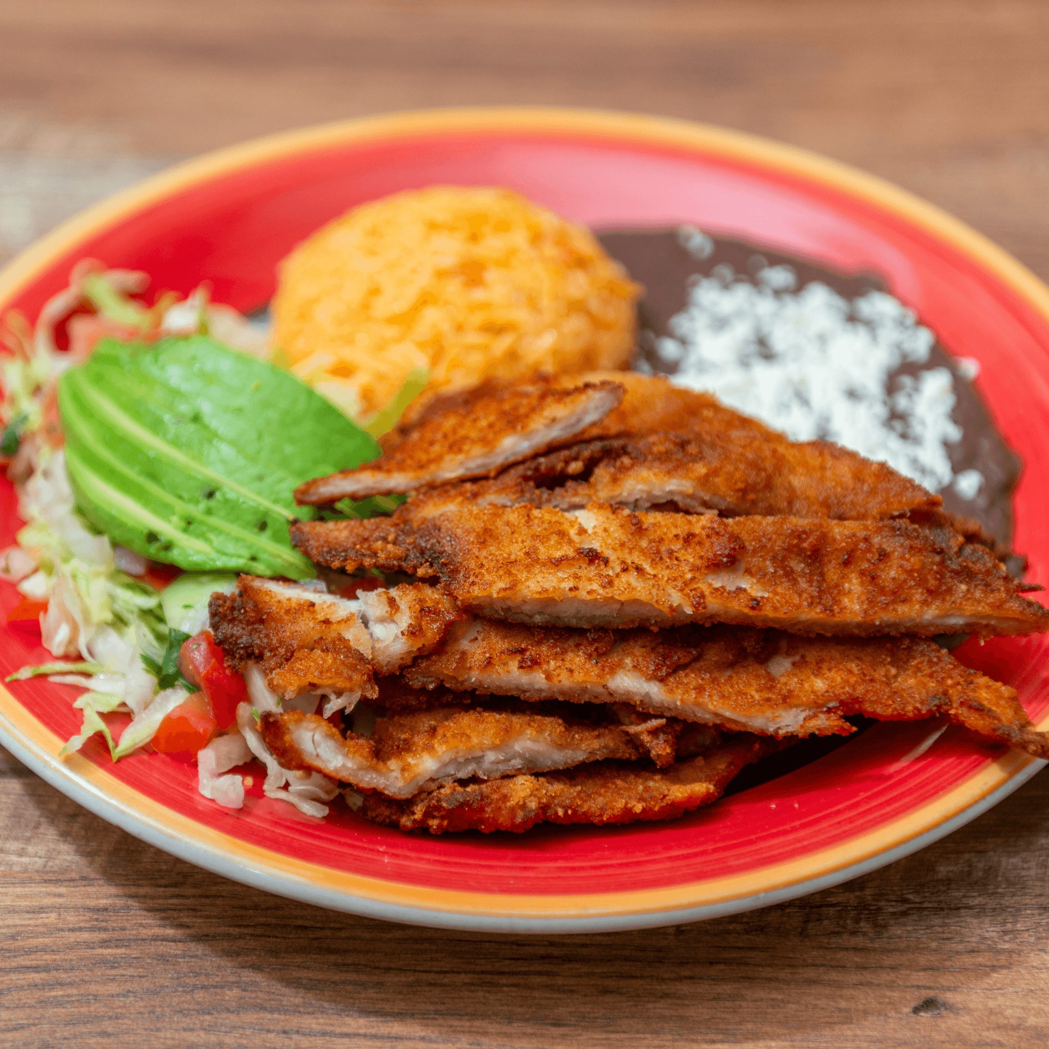 Milanesa de pollo platter.
